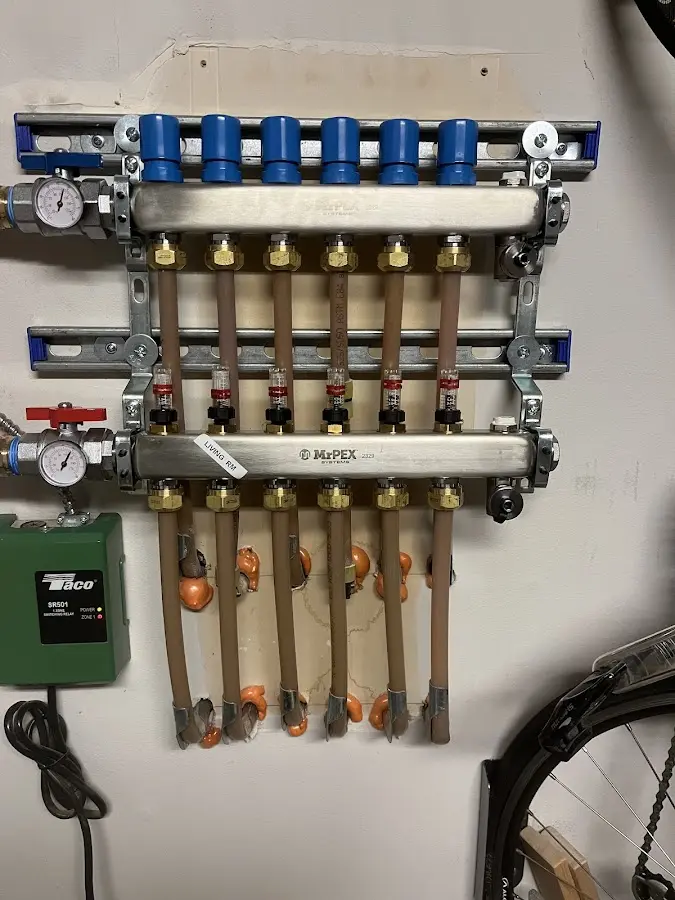 Plumber performing Gas Line Installation at a residential property in Mack